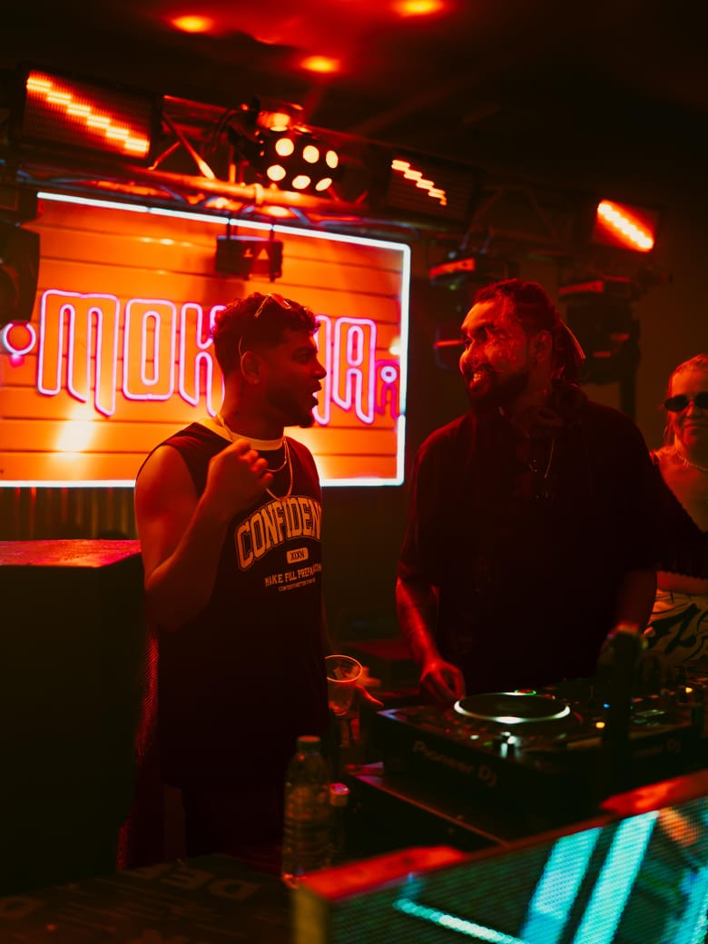 Mokshaa Hiriketiya guests under warm club lights